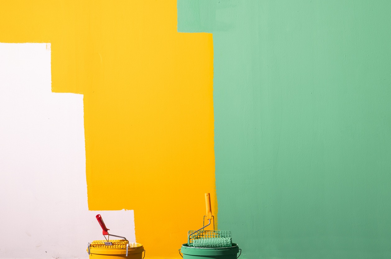 Paint roller on a bucket with paint