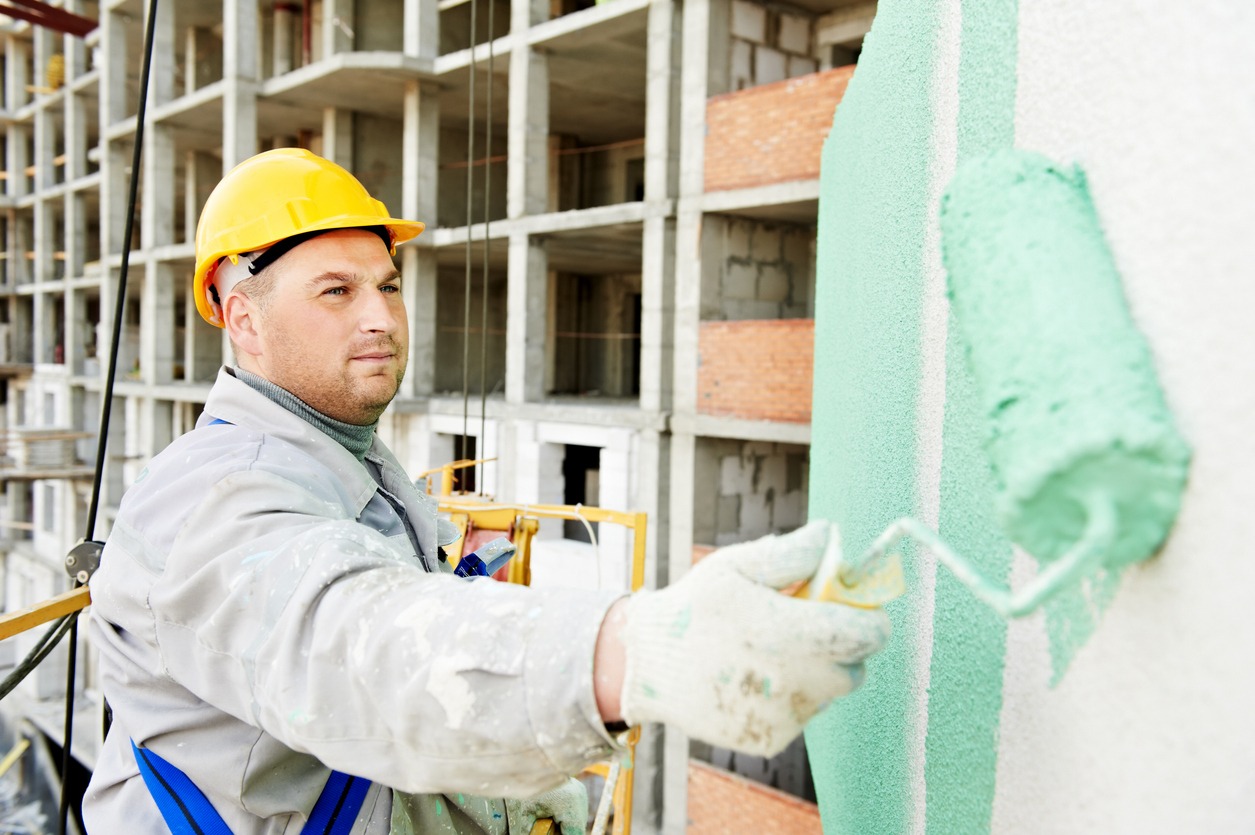 builder facade painter at work