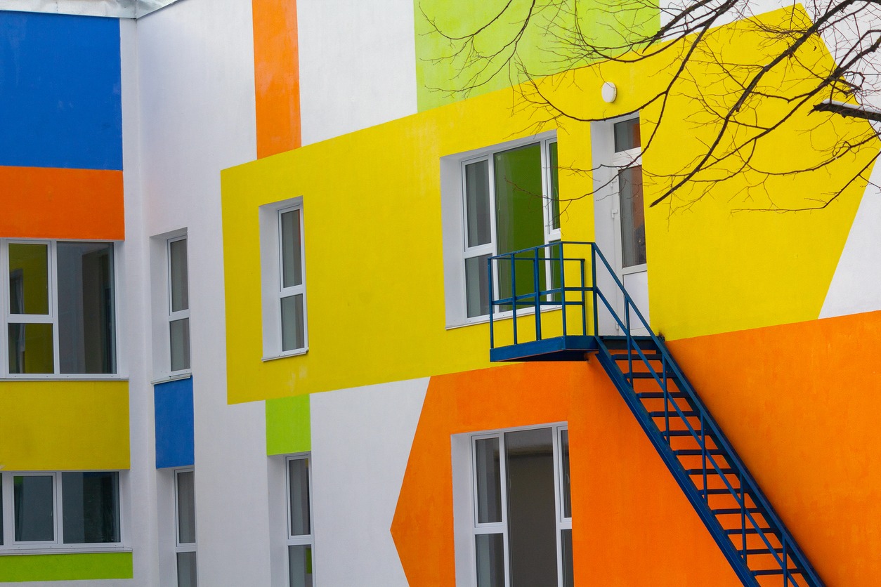 Multi-colored windows of the school in a contemporary style. Architecture