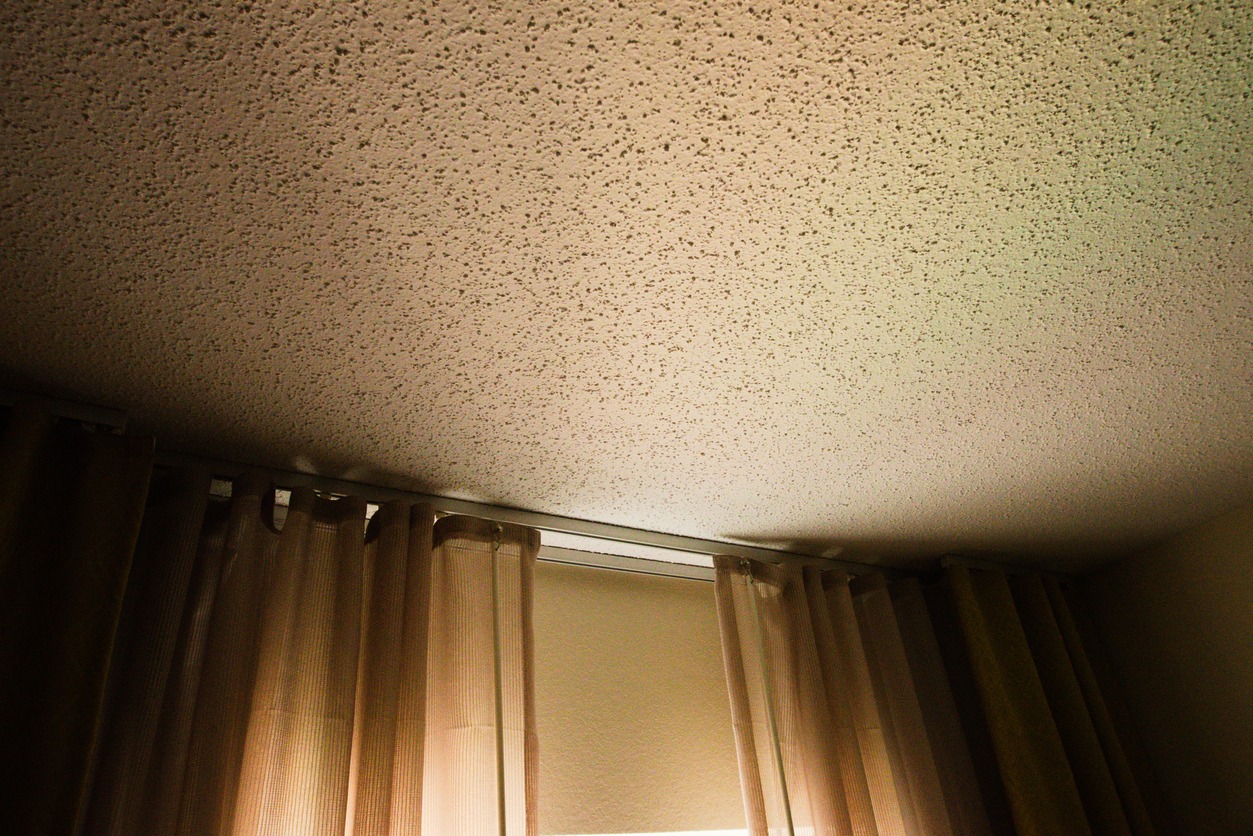 Dramatically lit American popcorn textured ceiling