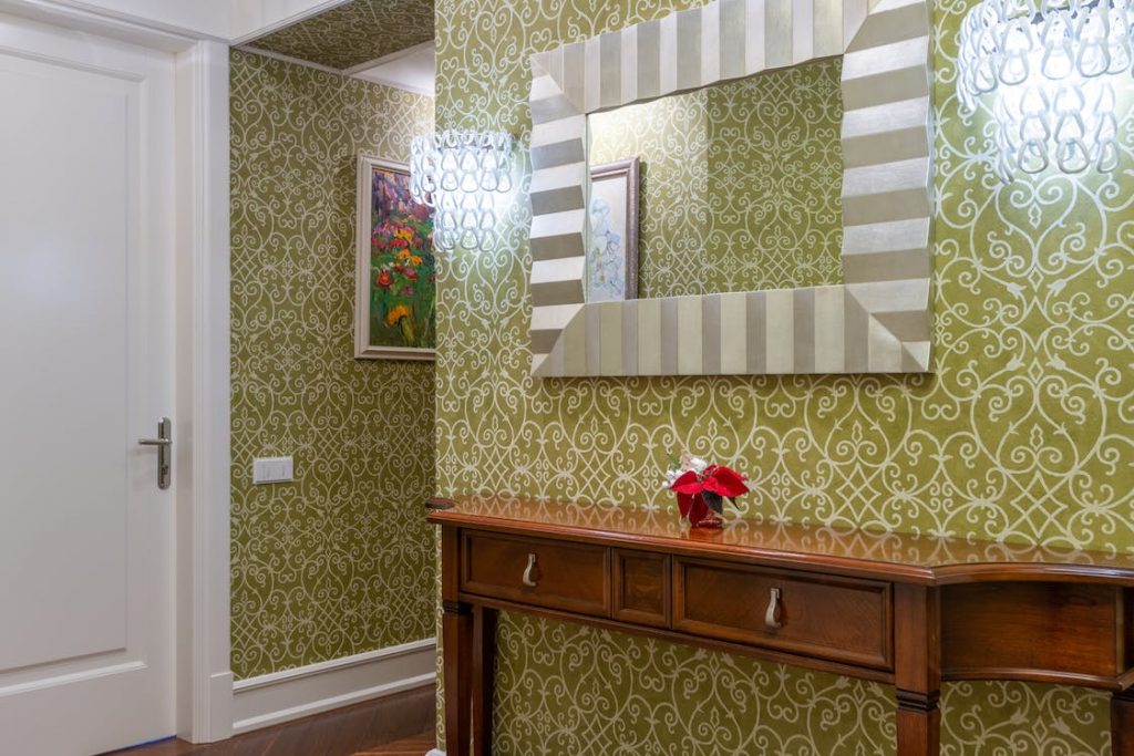 house hallway with a patterned wallpaper