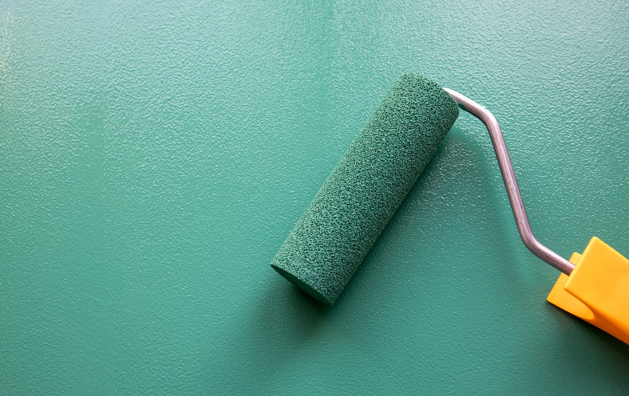 Paint roller with green colour