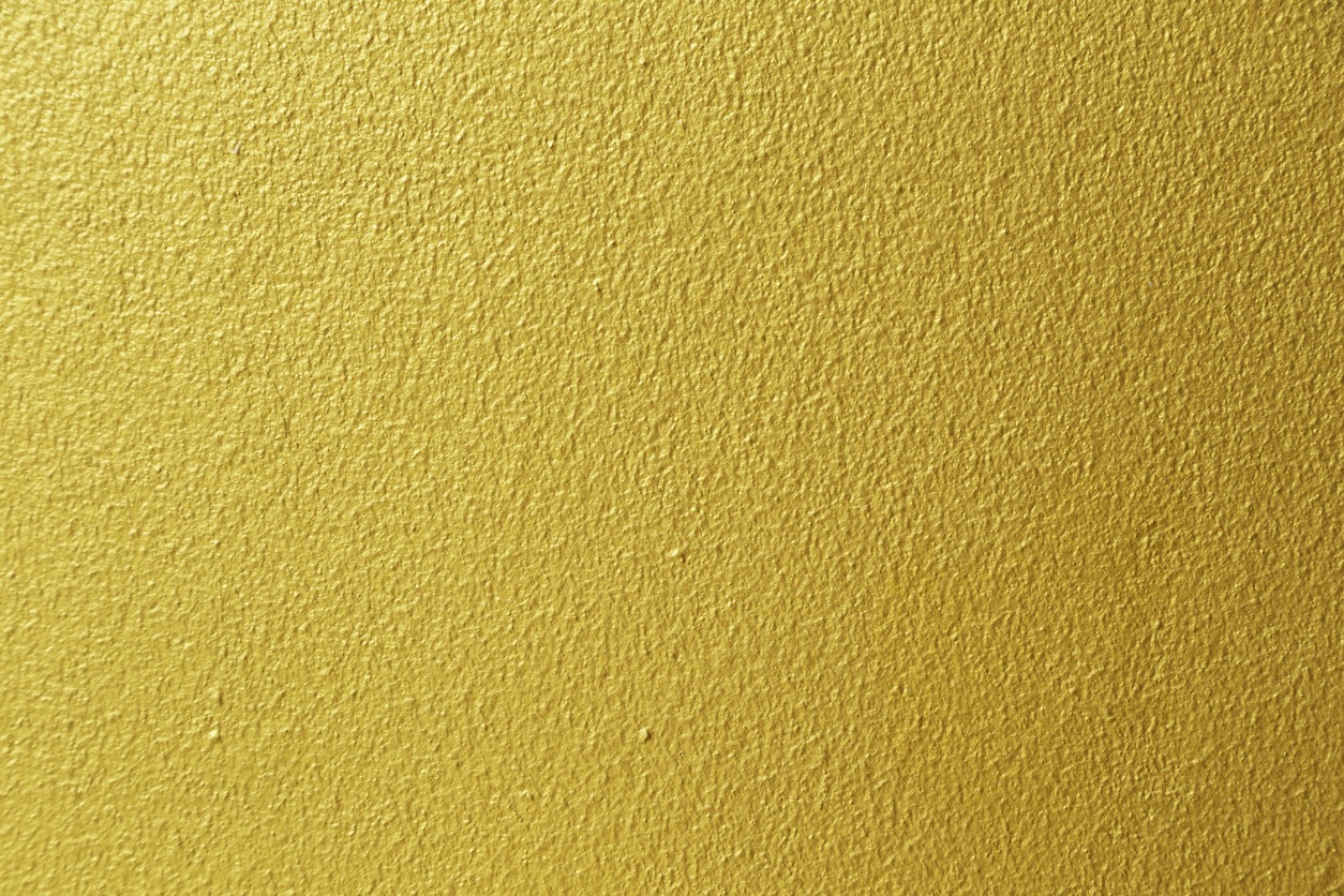 Golden color with an old grunge wall concrete texture