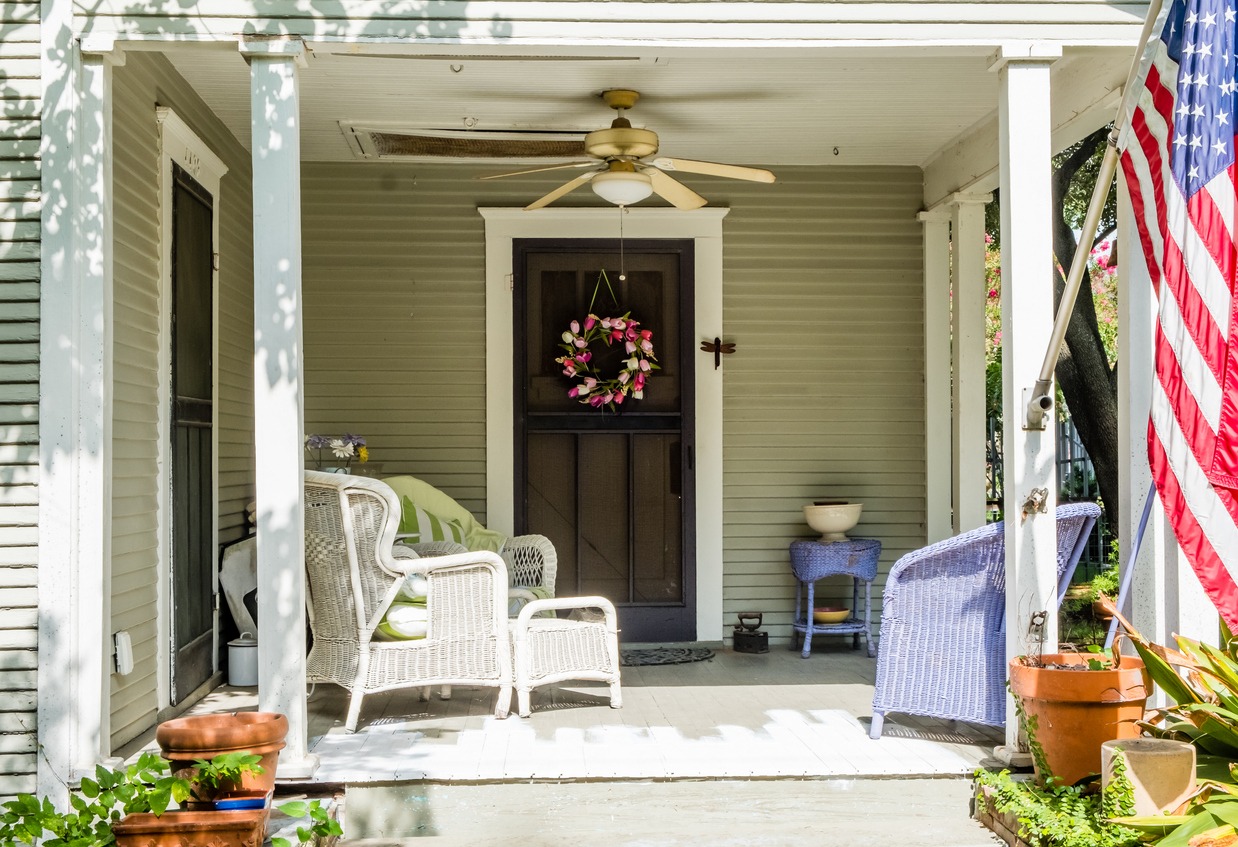 Americana - 1927 bungalow home front porch in Houston, TX