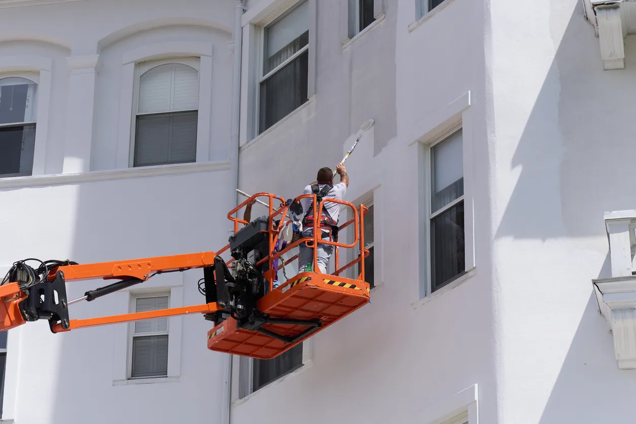 Painting the Omni Mt Washington Hotel on a boom lift