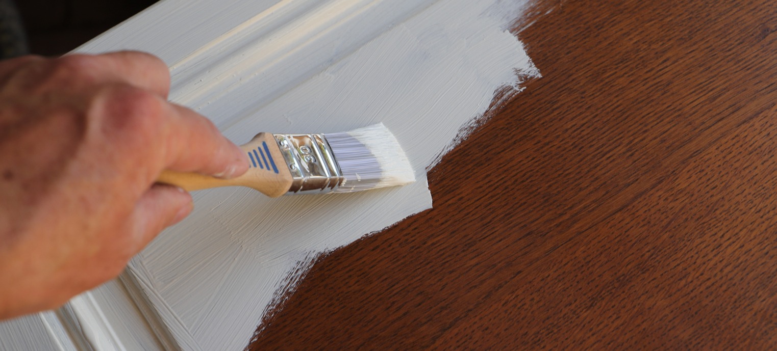 Paint a brown cabinet with white paint